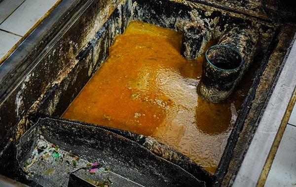 it's recommended to hire experts for grease trap cleaning due to the specialized equipment and knowledge required